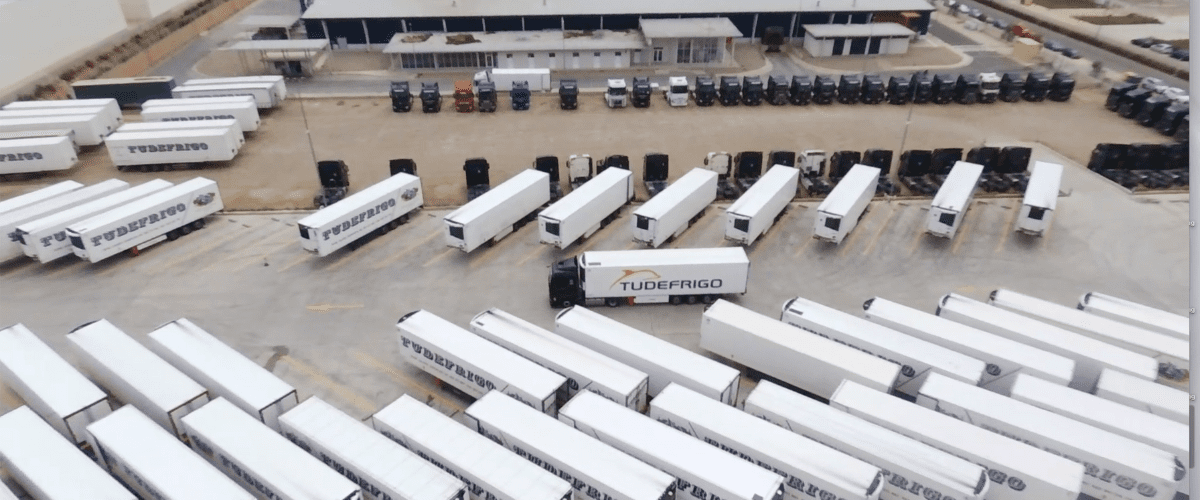 Tudefrigo trucks in the back of a warehouse